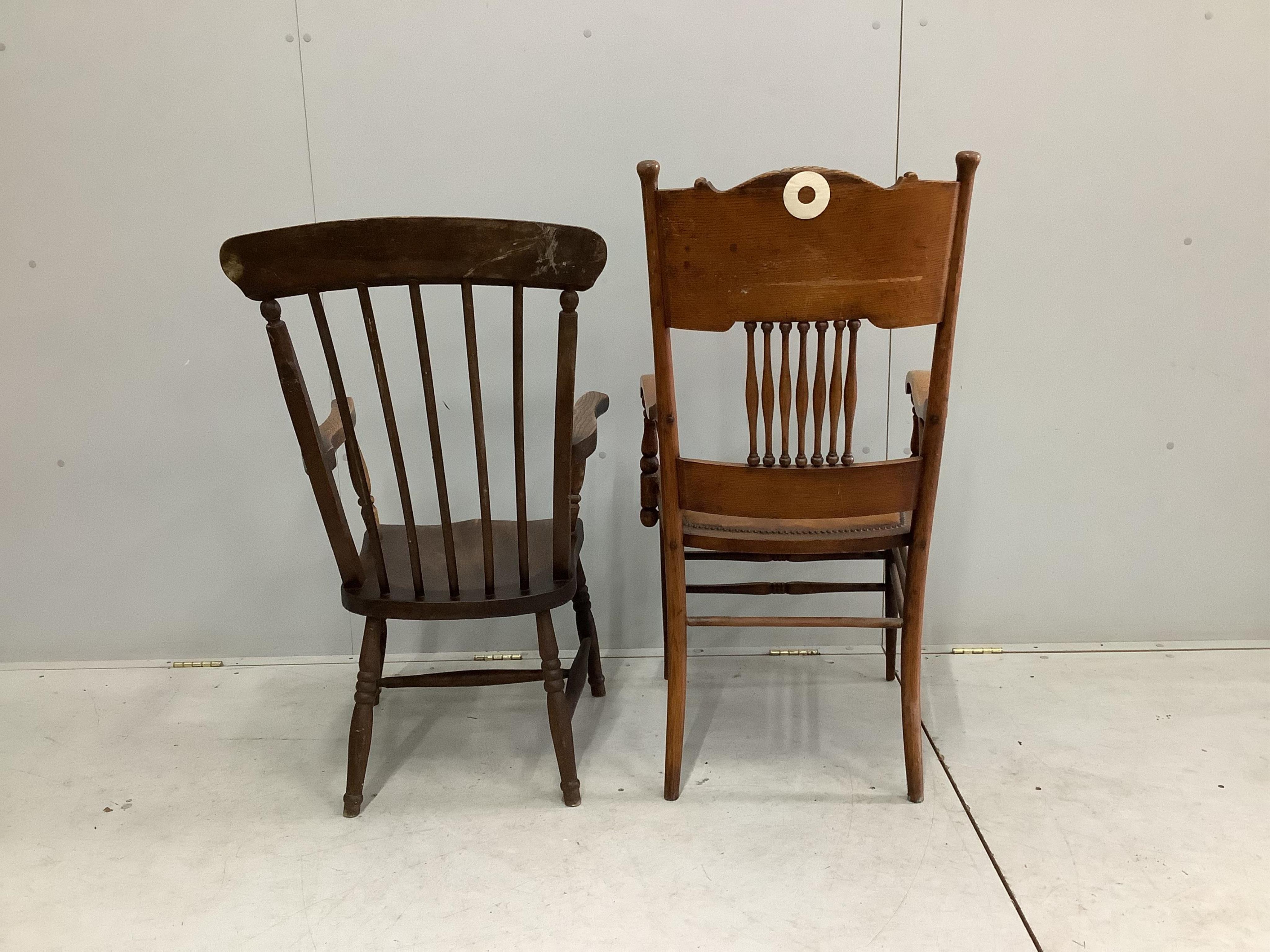 A Victorian Windsor comb back armchair, reduced and an early 20th century American oak elbow chair, larger width 55cm, depth 48cm, height 107cm. Condition - fair